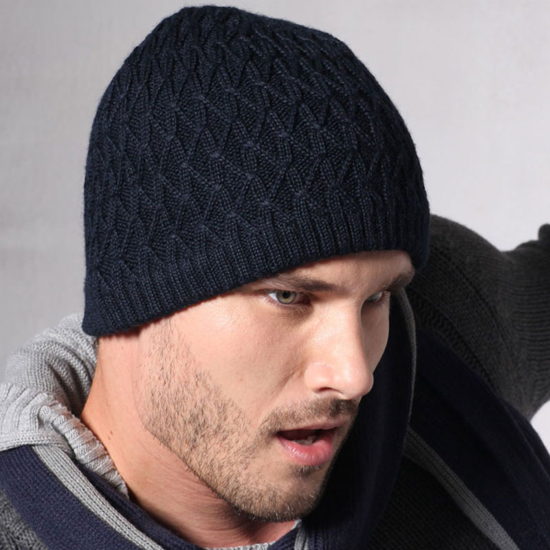 Wholesale Custom Made cable Knit scull beanies decorated with woven tab.